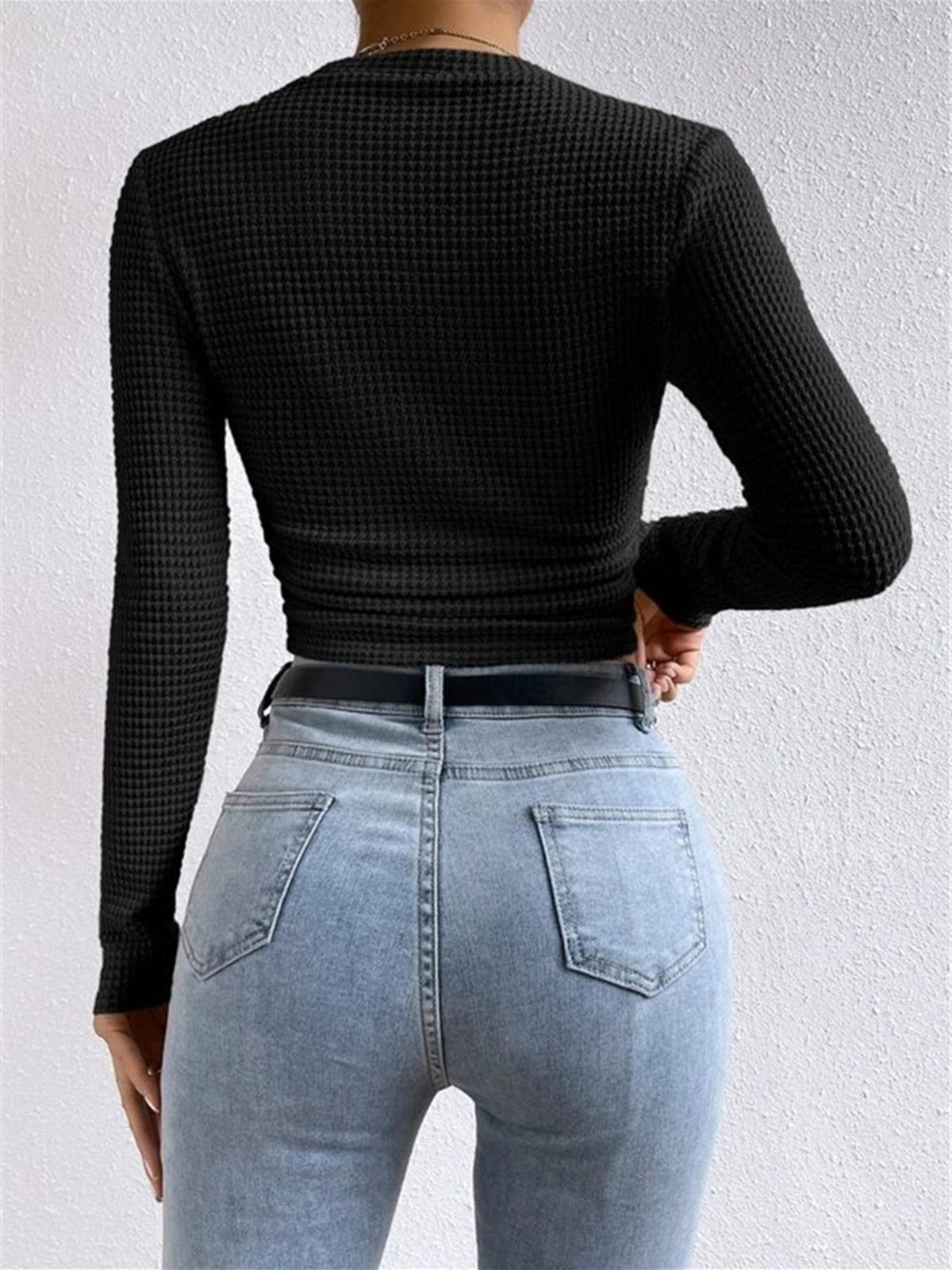 Eenvoudige slimfit trui van wafelbreisel