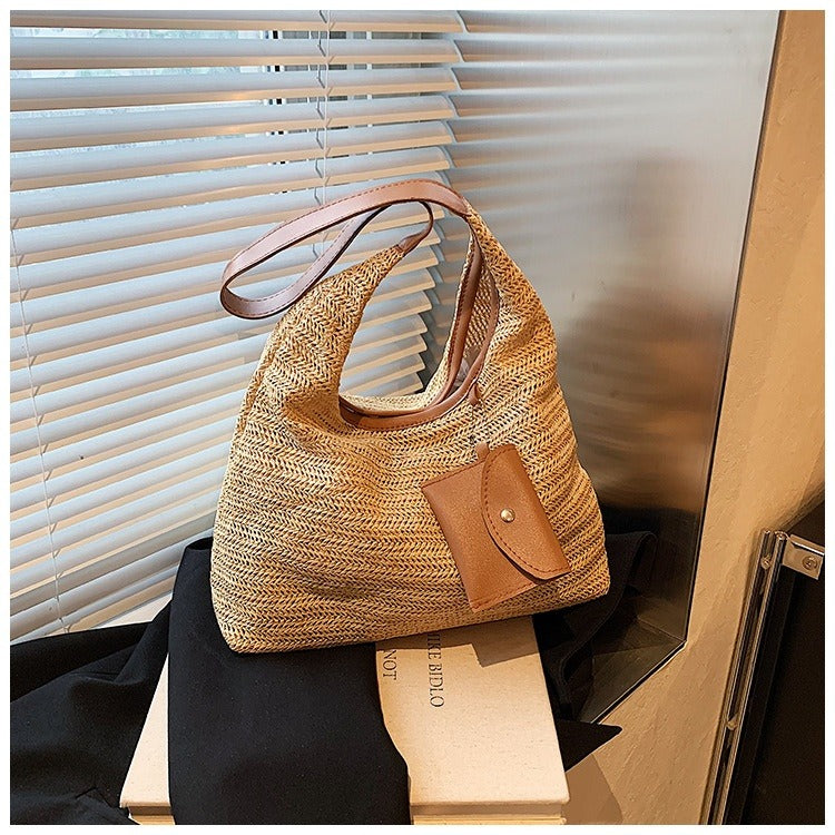 Dames handtas van gevlochten raffia met tasdetail - Martina