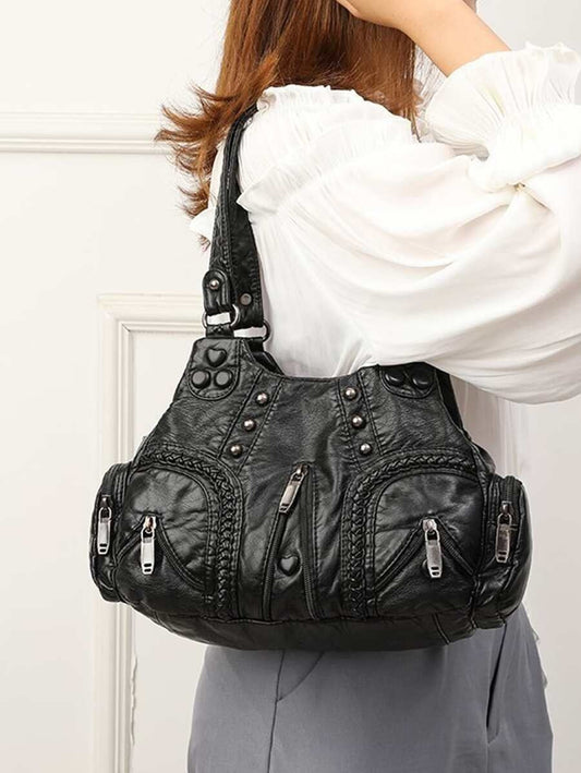 Taranta - Zwarte schoudertas met studs