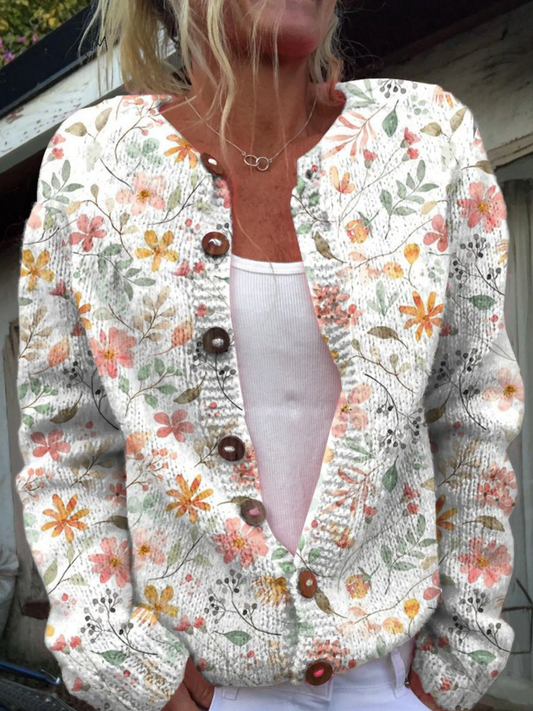 Vest met een leuk en fris bloemenpatroon en knoopsluiting