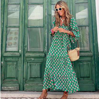 Cassandra - Damesjurk met geometrische print in hoog-laag-look