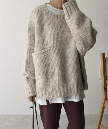 Oversized ivoorkleurige trui met voorzak