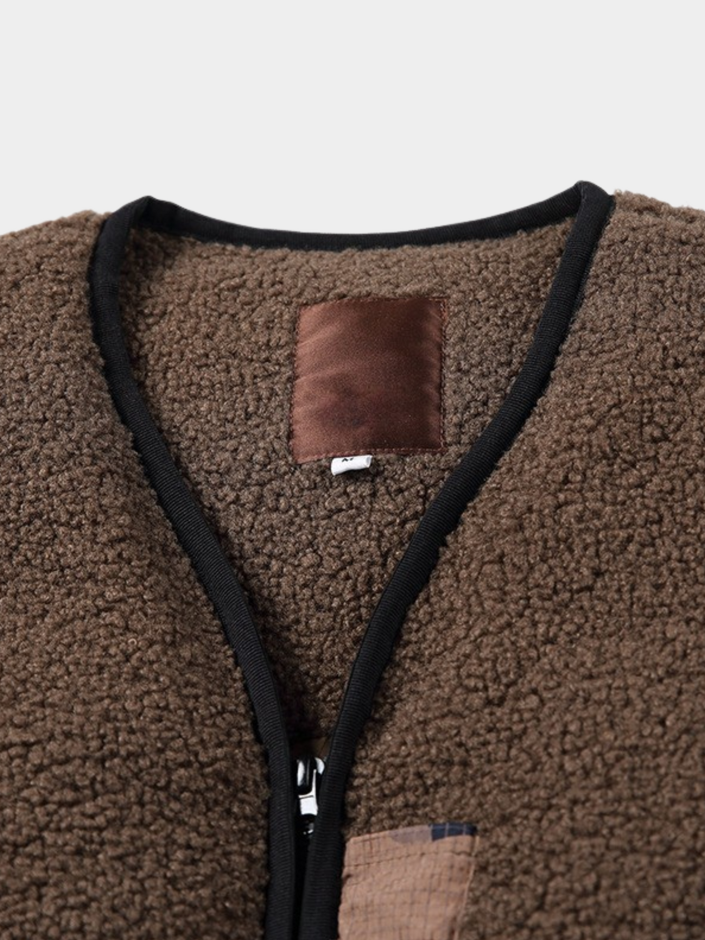 HeatClip – Heren donzen bodywarmer met camouflage zakken, contrasterende details en Sherpa-voering