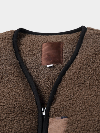 HeatClip – Heren donzen bodywarmer met camouflage zakken, contrasterende details en Sherpa-voering