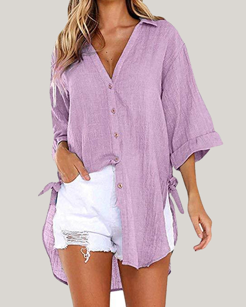 Lange blouse met strikbandjes aan de zijkanten