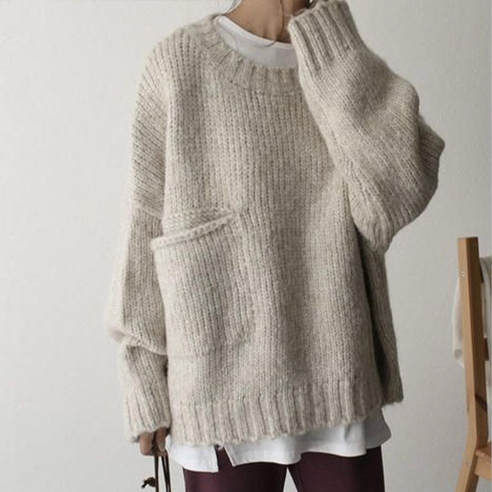 Oversized ivoorkleurige trui met voorzak