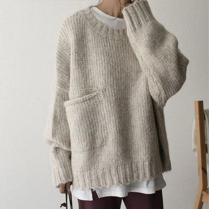 Oversized ivoorkleurige trui met voorzak