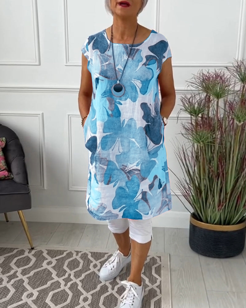 KLARISSA IN LANGE BLOEMENBLOUSE