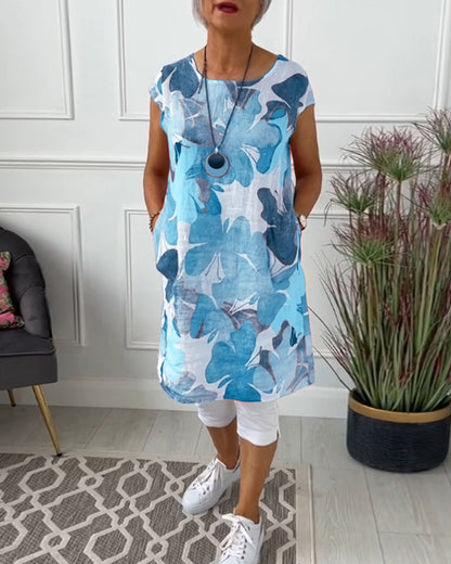 KLARISSA IN LANGE BLOEMENBLOUSE