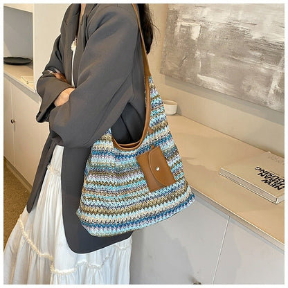 Dames handtas van gevlochten raffia met tasdetail - Martina