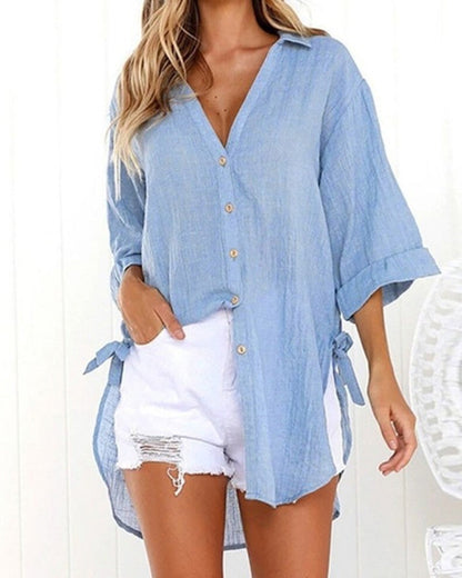 Lange blouse met strikbandjes aan de zijkanten