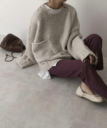 Oversized ivoorkleurige trui met voorzak
