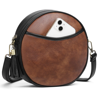 Noelia - Ronde dames schoudertas in vintage lederlook