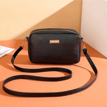 Sac à bandoulière en cuir synthétique pour femme au design minimaliste - Clara
