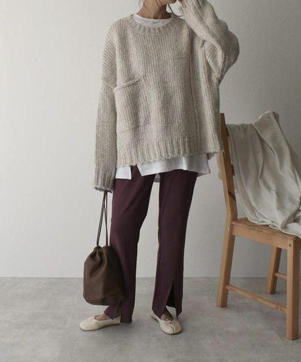 Oversized ivoorkleurige trui met voorzak