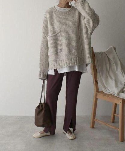 Oversized ivoorkleurige trui met voorzak