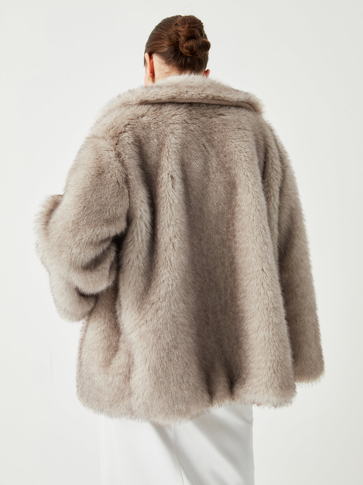 Oversized faux fur coat met kraag