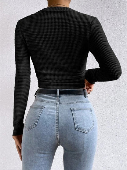 Eenvoudige slimfit trui van wafelbreisel