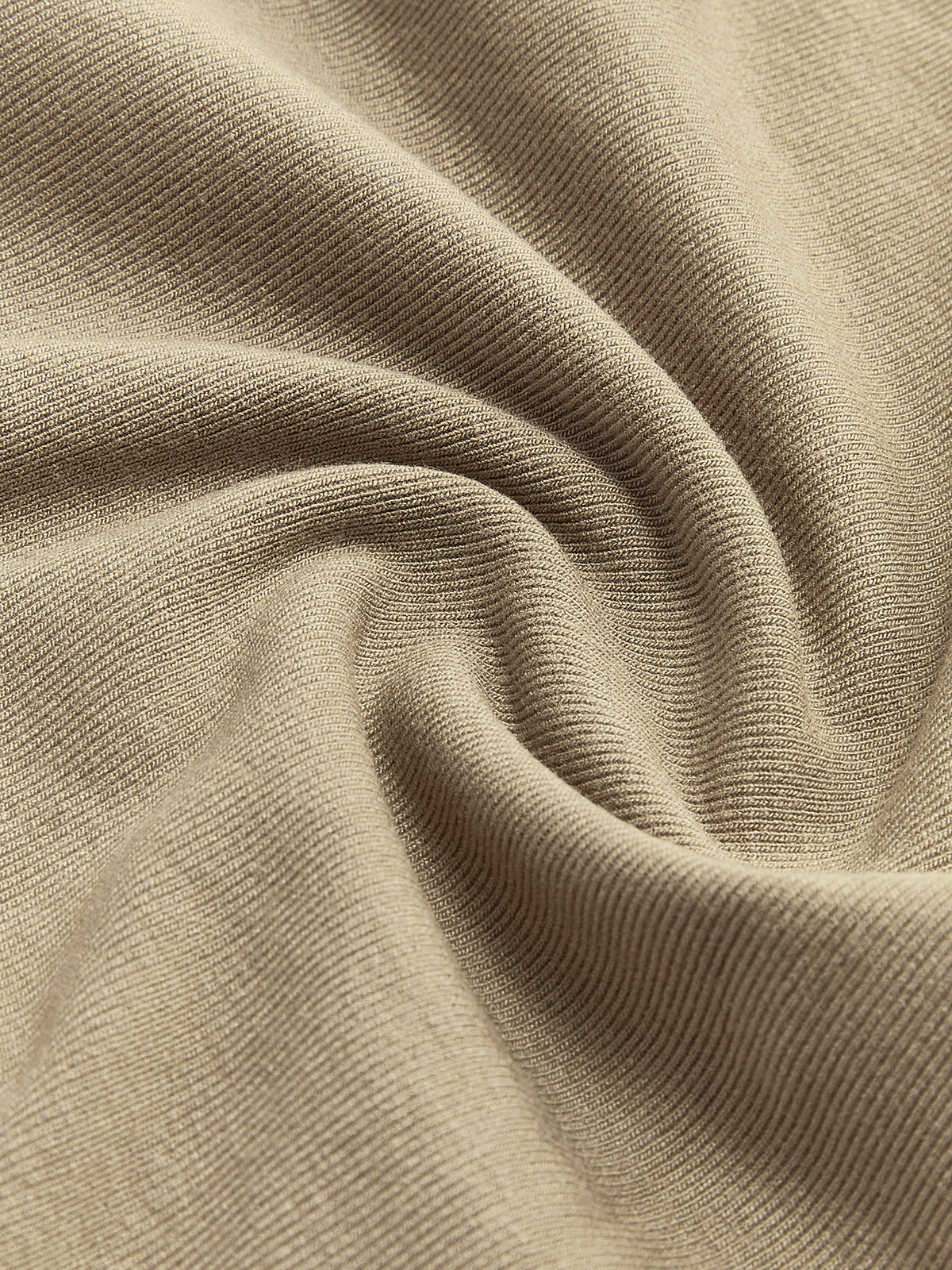 Geripptes Strickshirt mit langen Ärmeln und asymmetrischem Schnitt