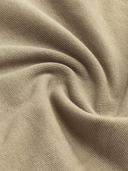 Geripptes Strickshirt mit langen Ärmeln und asymmetrischem Schnitt
