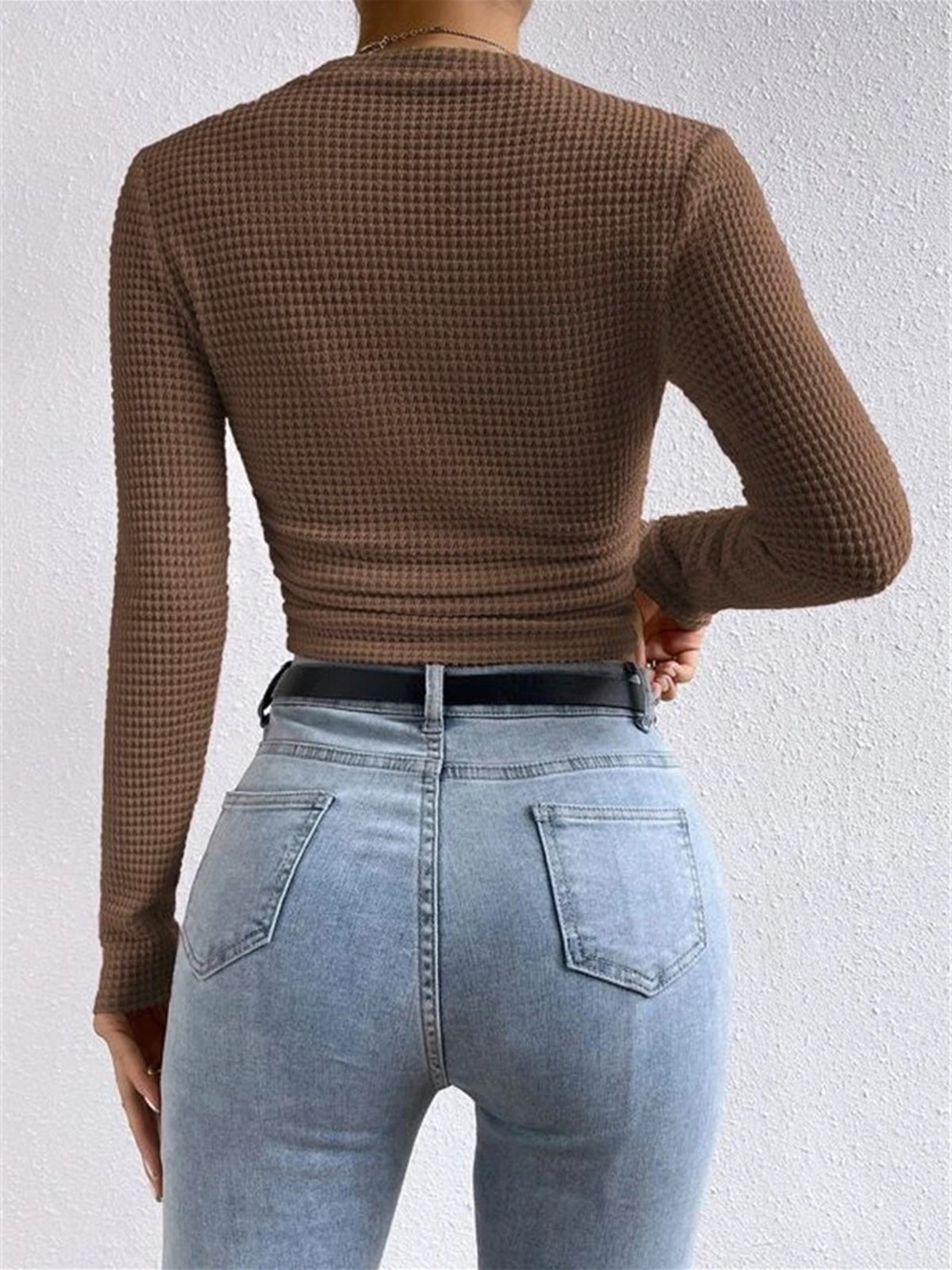 Eenvoudige slimfit trui van wafelbreisel