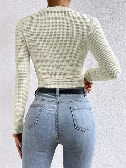 Eenvoudige slimfit trui van wafelbreisel