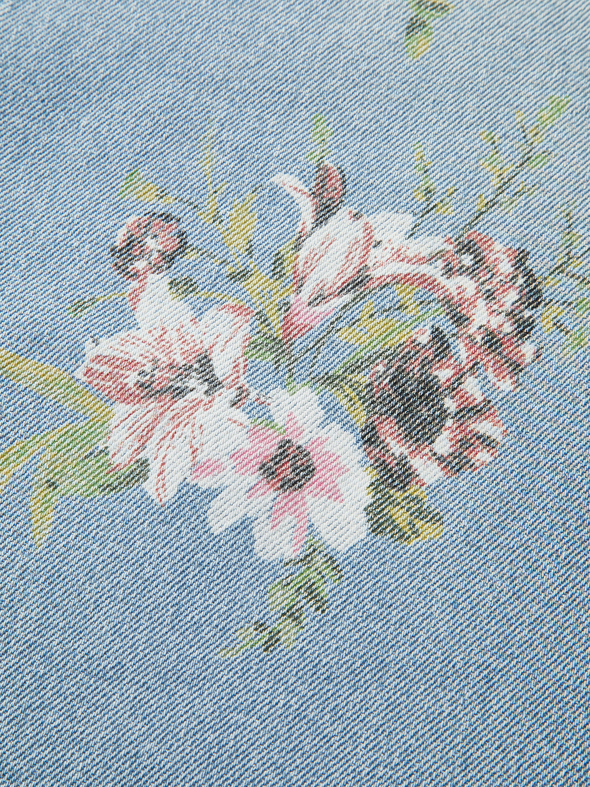 Denimbroek met bloemenprint en middelhoge taille