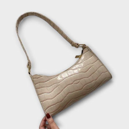 Glänzende Ledertasche