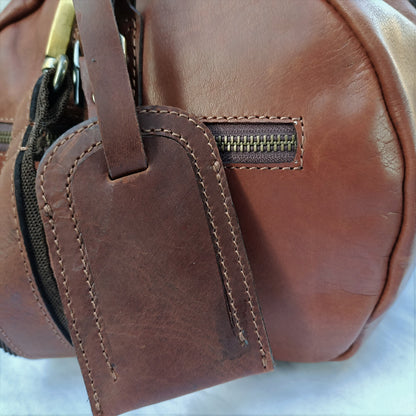 Hellbraune Leder-Duffel-Tasche