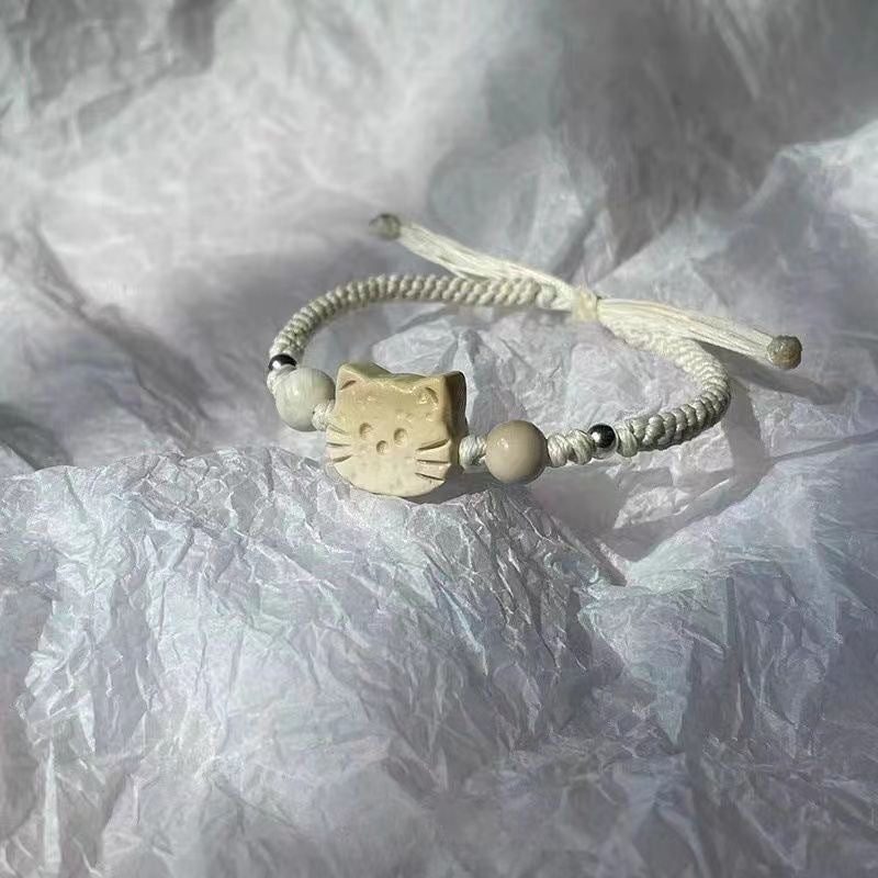 Gevlochten armband met cartoonkat