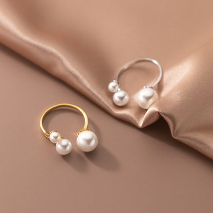 Verstelbare ring met drievoudige zoetwaterparel