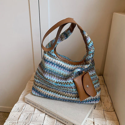 Dames handtas van gevlochten raffia met tasdetail - Martina