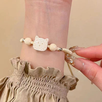 Gevlochten armband met cartoonkat