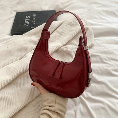 bella™ – vintage halvemaan schoudertas