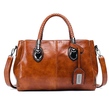 Pia™ | Elegante Ledertasche mit Geflochtenen Henkeln
