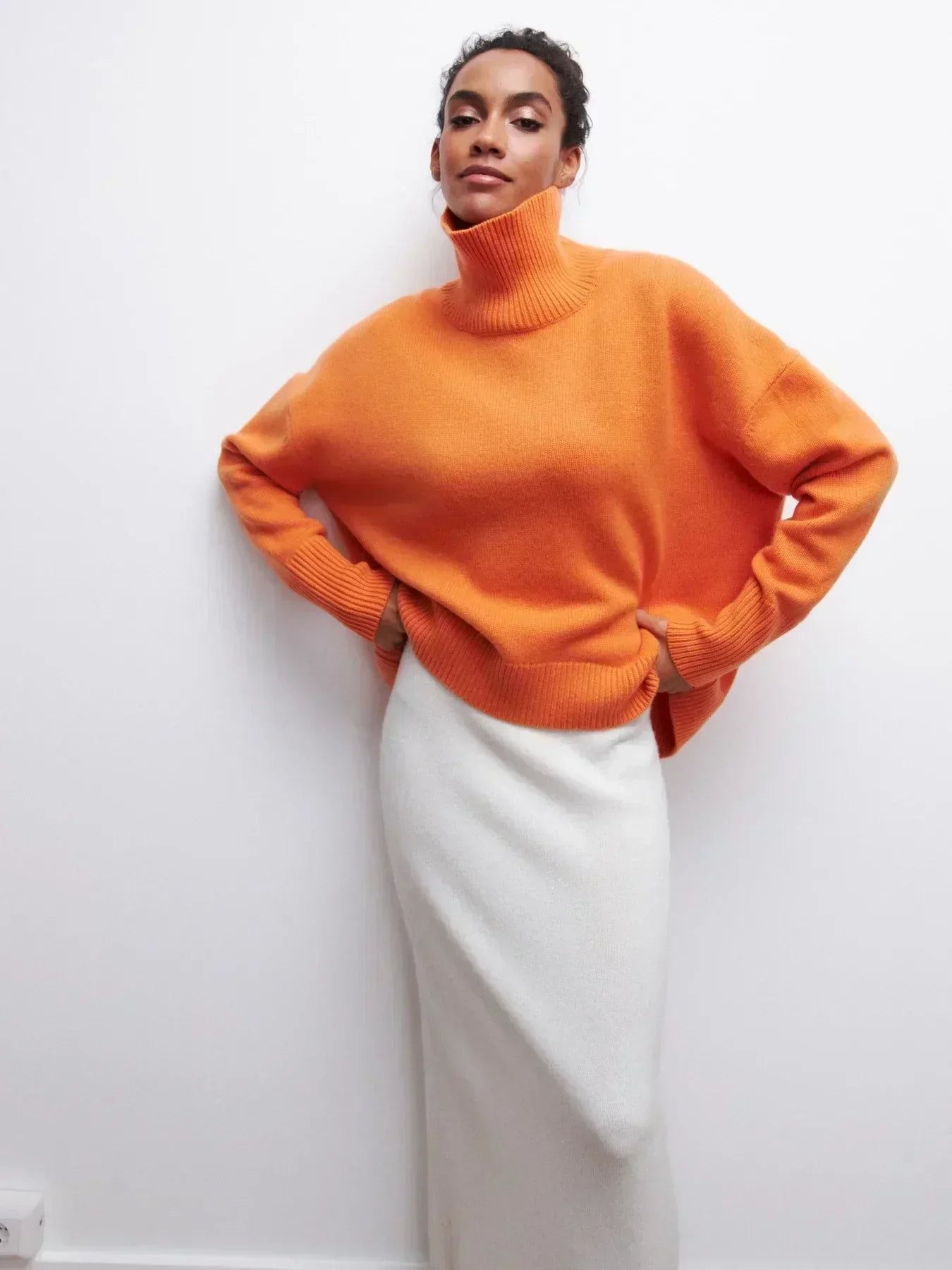Eden - Oversized coltrui met rolkraag