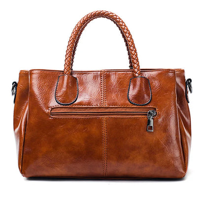 Pia™ | Elegante Ledertasche mit Geflochtenen Henkeln