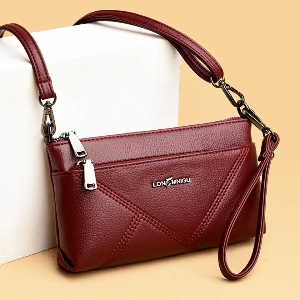 aline™ – elegante schoudertas die crossbody gedragen kan worden