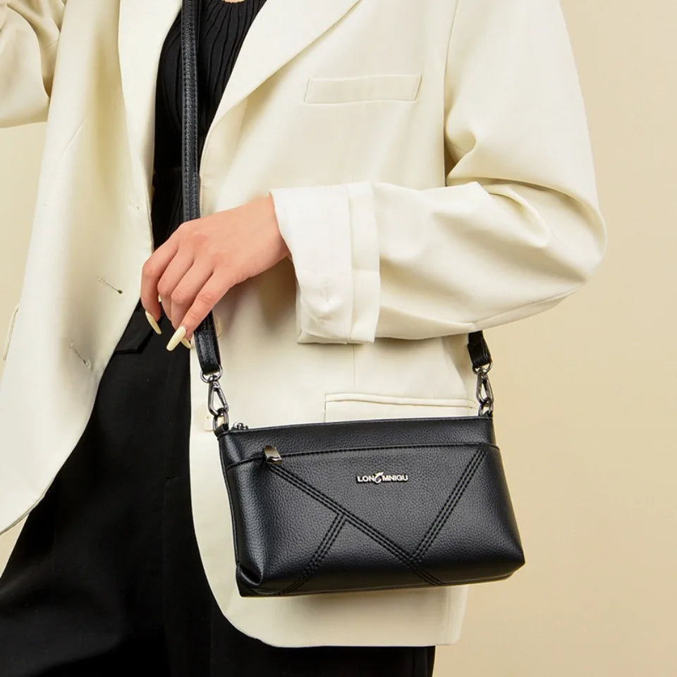 aline™ – elegante schoudertas die crossbody gedragen kan worden