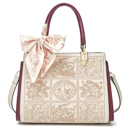 sylvia™ – unik crossbody med broderi og sløjfedetalje