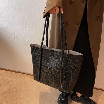 Betina™ – Schultertasche aus Krokodilleder