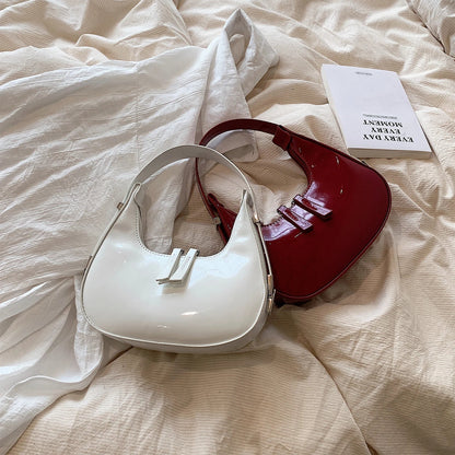 bella™ – vintage halvemaan schoudertas