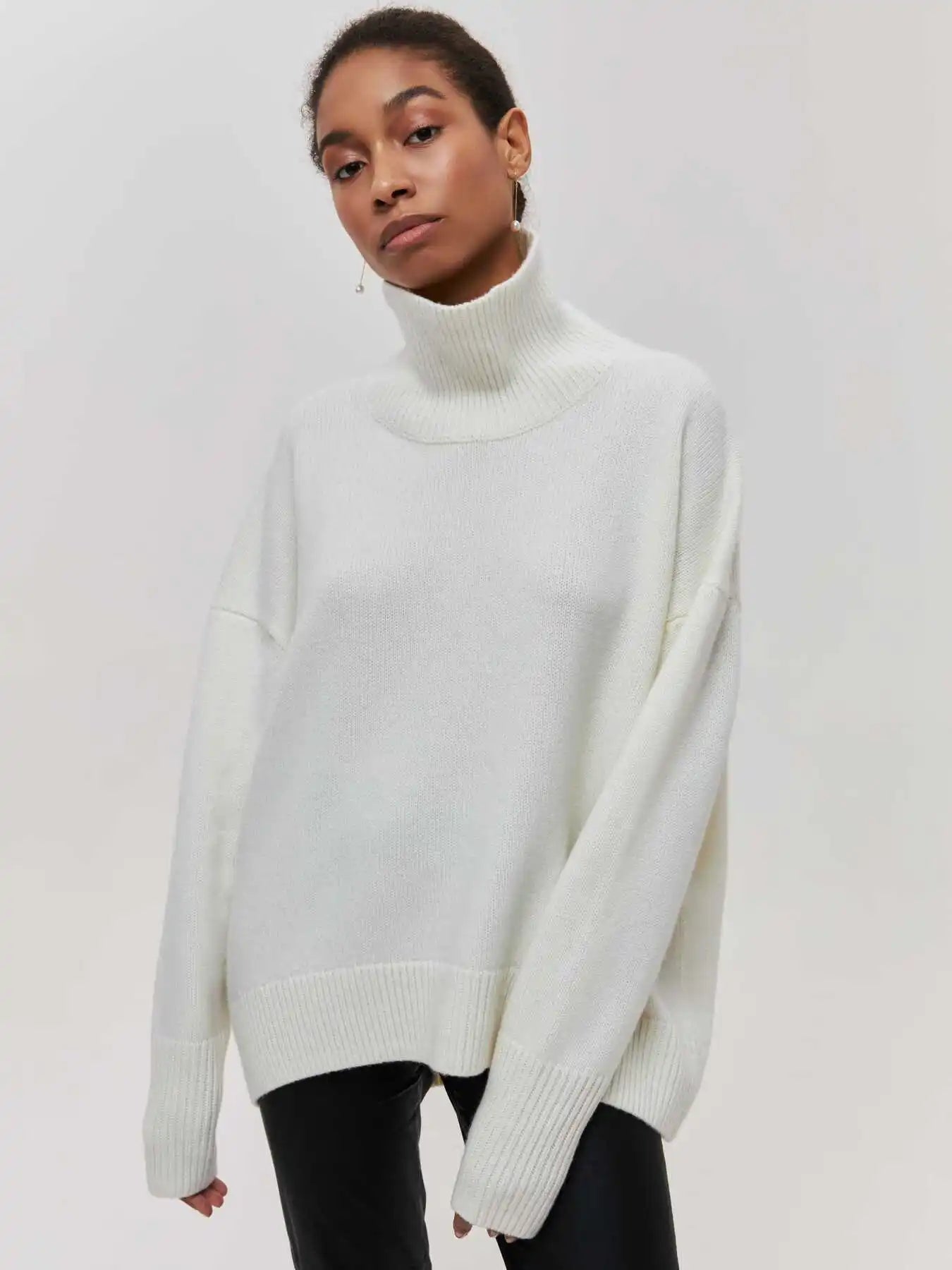 Eden - Oversized coltrui met rolkraag