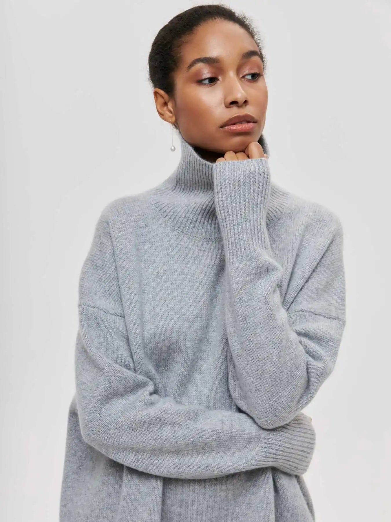 Eden - Oversized coltrui met rolkraag