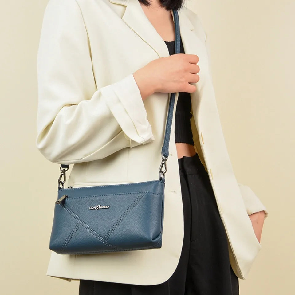 aline™ – elegante schoudertas die crossbody gedragen kan worden