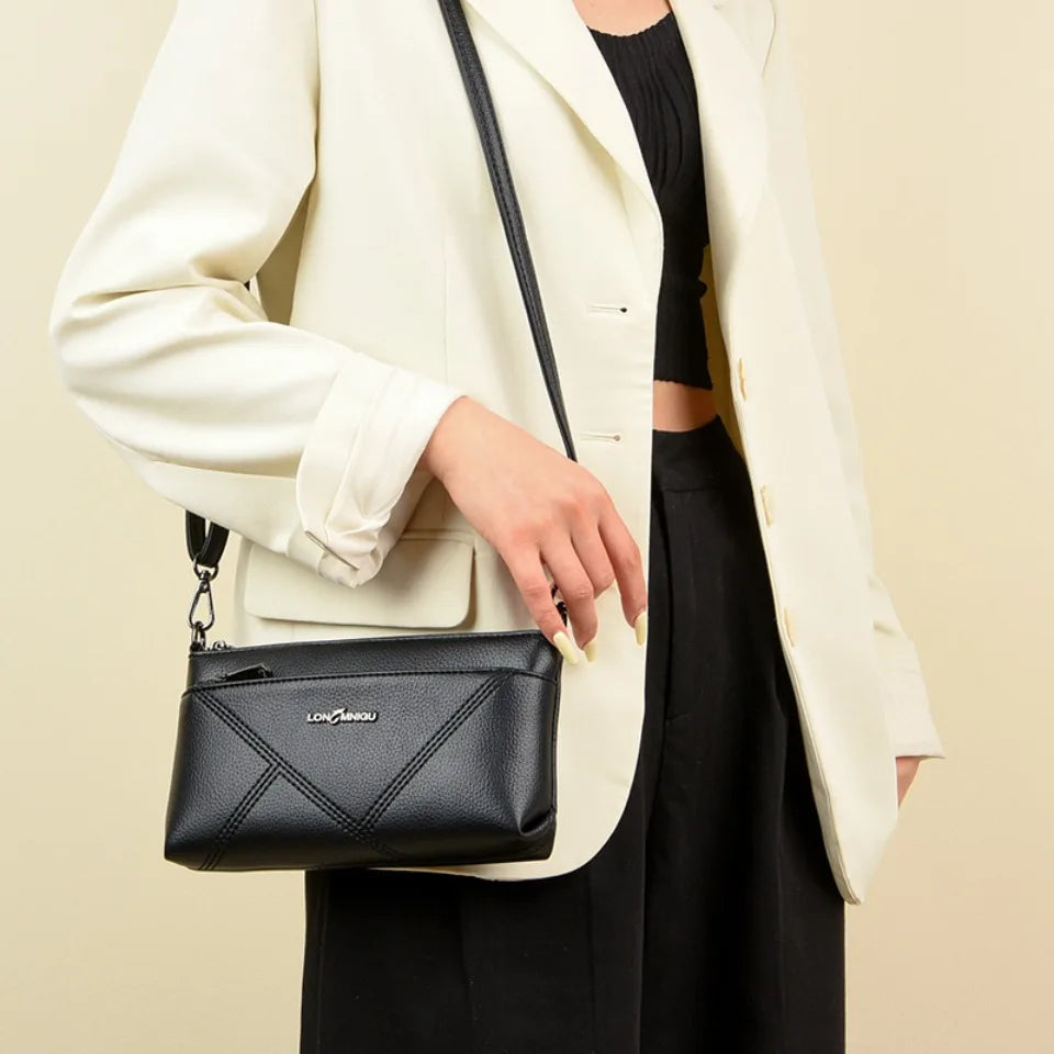 aline™ – elegante schoudertas die crossbody gedragen kan worden