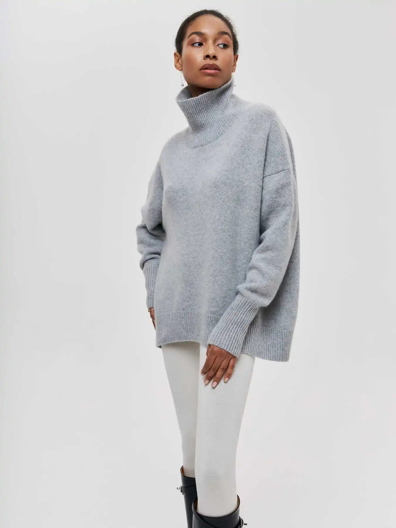 Eden - Oversized coltrui met rolkraag