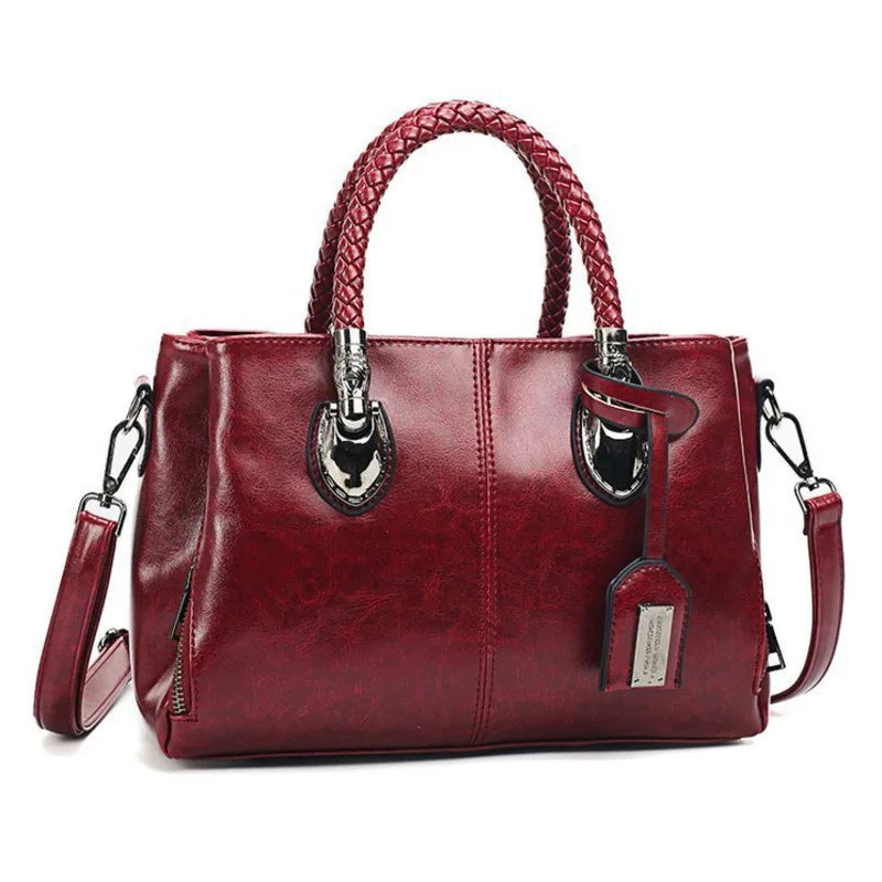 Pia™ | Elegante Ledertasche mit Geflochtenen Henkeln
