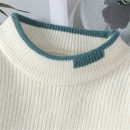 Patchwork gebreide trui