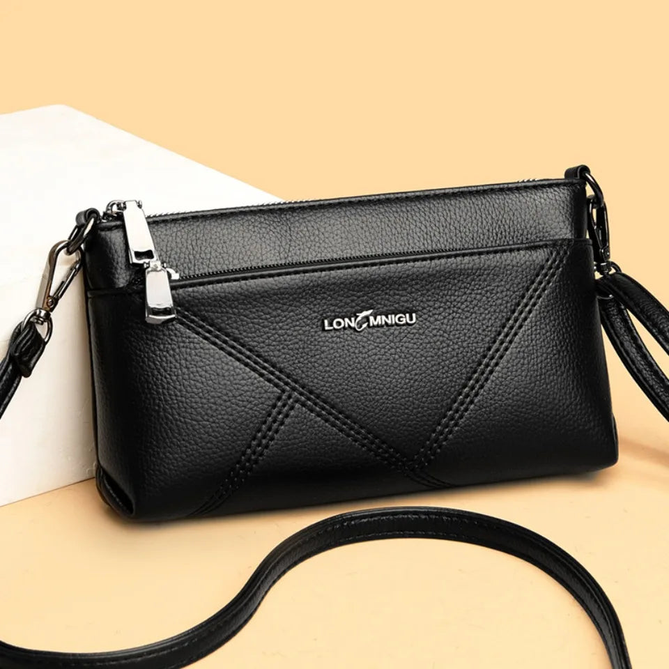 aline™ – elegante schoudertas die crossbody gedragen kan worden